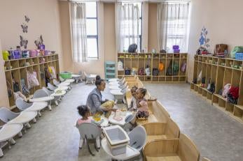 Ethiopian mother and children in daycare facility.