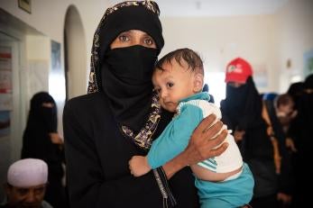 Fawzia, pictured with her son mohammed in 2018, was struggling to find food for her four children. at a prosper global supported clinic, she found the support she and her family so desperately needed.