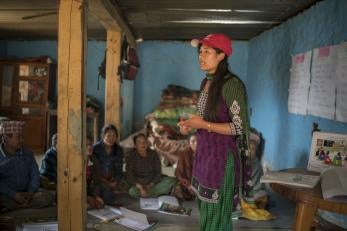 Prosper global employee speaks to nepalese community group.
