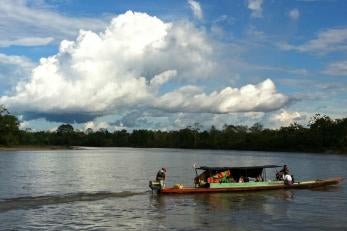 Prosper Global team members and government officials on the way to Putamayo, deep in the Colombian jungle.