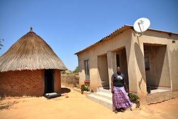 Woman outside house