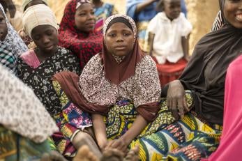Girls sitting together at a prosper global girls group in niger