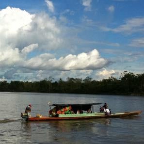 Prosper global team members and government officials on the way to putamayo, deep in the colombian jungle.