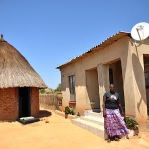 Woman outside house