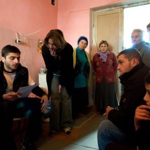 A former school building now being housed with idp's from the gori area who were dislocated by the bombing. prosper global staff meet with them to assess their winterization needs. photo: jeffrey austin for prosper global