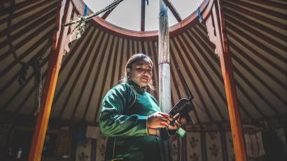 Woman in mongolia with a drone