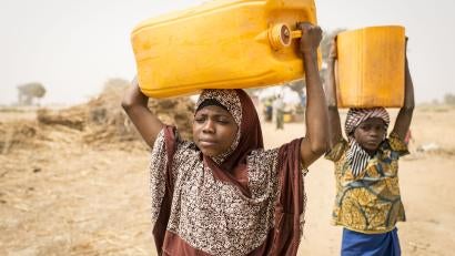 3:16 p.m. — Back to the well, Badariya fetches water to bring to the families' cows. “I don't like carrying that big jug to get water,” she tells me when I ask about the hardest part of her life.