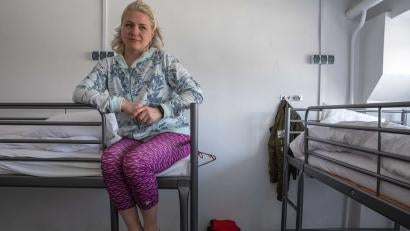 “We feel good here, but our hearts and souls are with Ukraine,” said Anna Sydorenko who sits on her bunk at a shelter for refugees in Warsaw, Poland. The shelter was once a hostel and through a partnership with a local Polish organisation, Prosper Global pays the rent, staff salaries, and for food and supplies. 